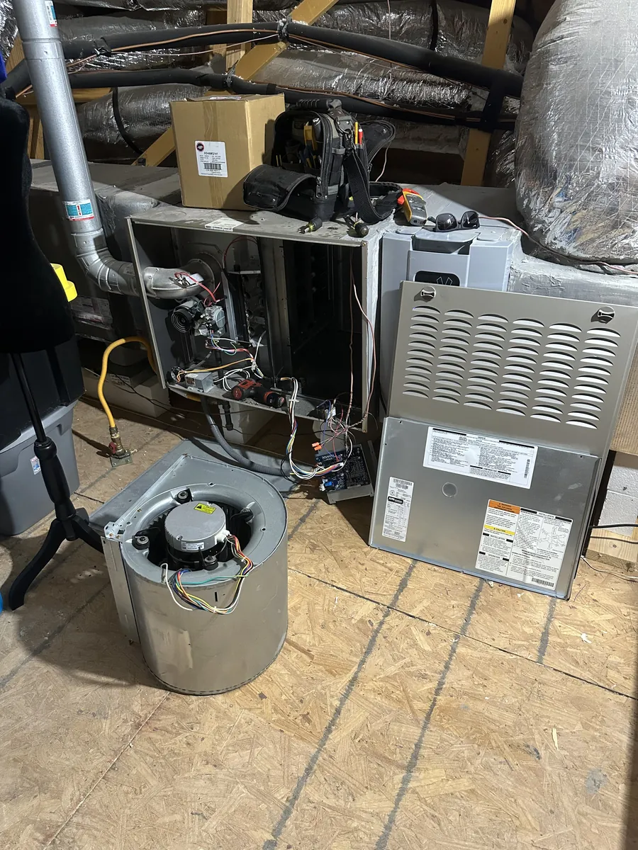 Blower motor replacement on a residential heating system in Georgetown, Texas